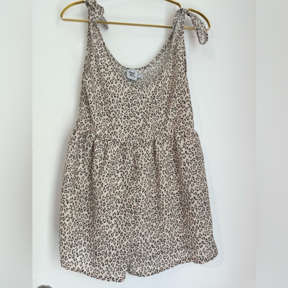 Princess Poly, size 2, cheat print romper.